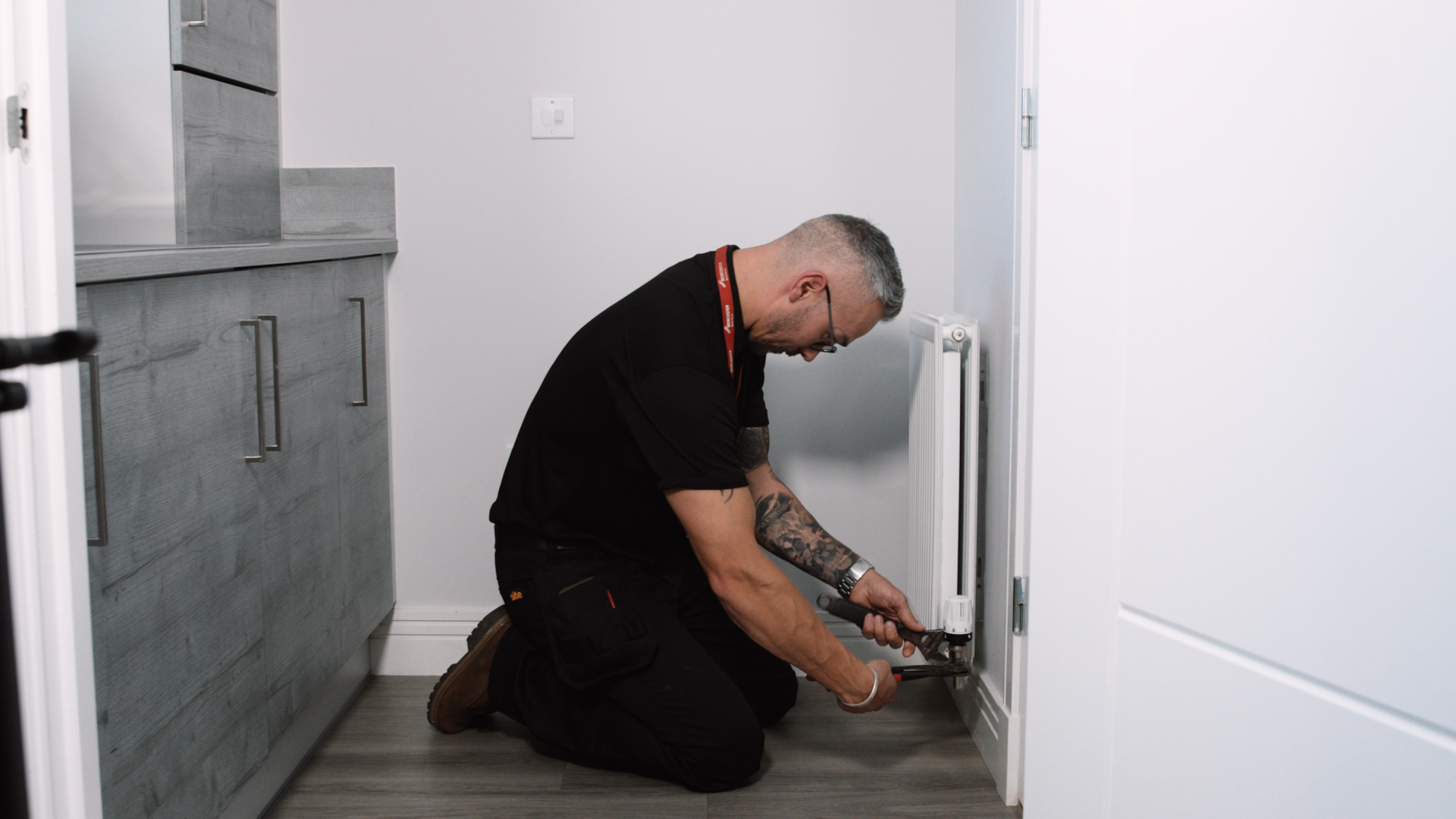 Aspire engineer carrying out heating work in an Edinburgh home
